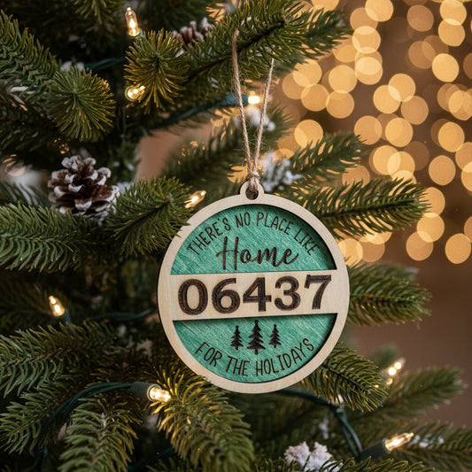 Round wooden ornament with text and numbers on a wooden surface