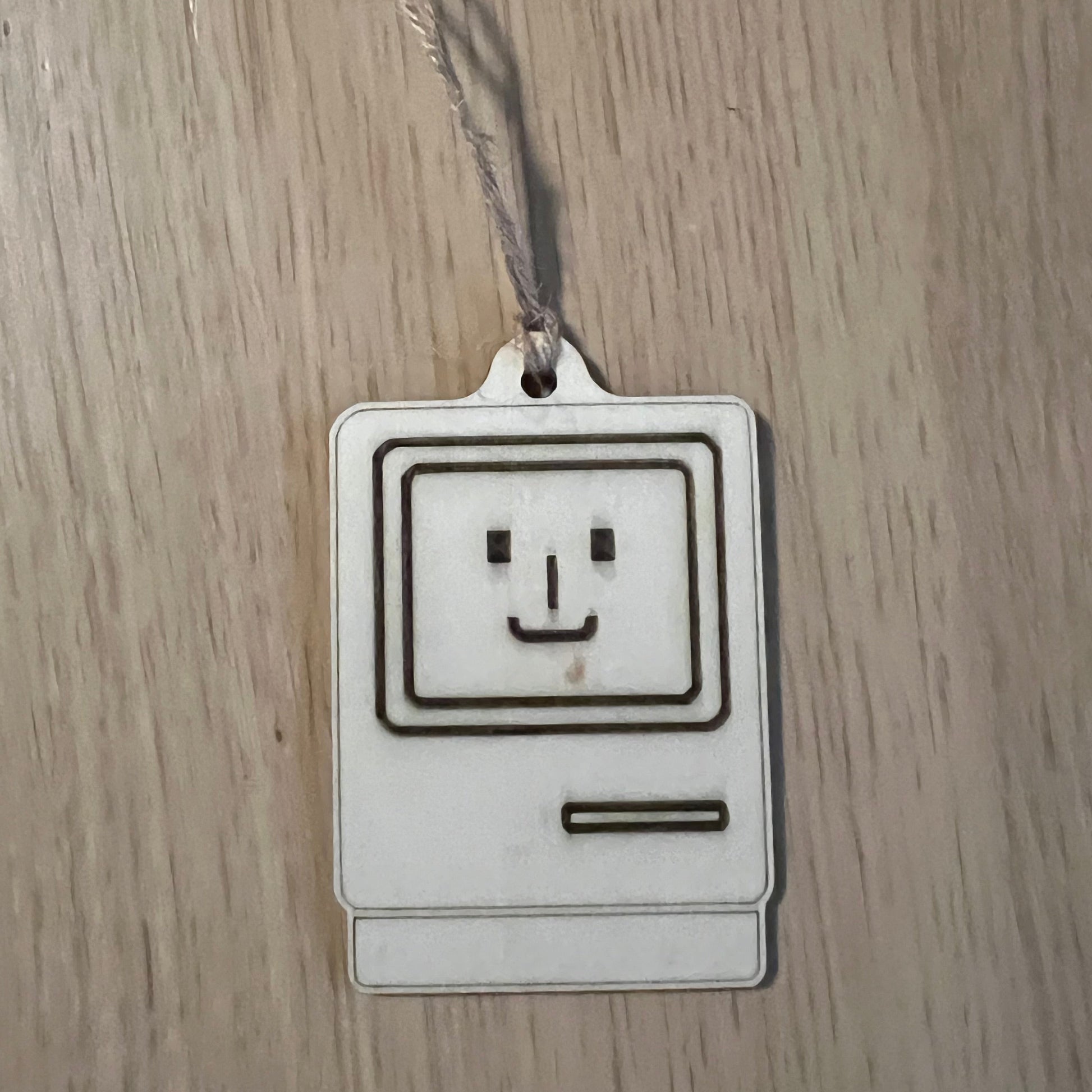 Decorative item with a geometric design on a wooden surface