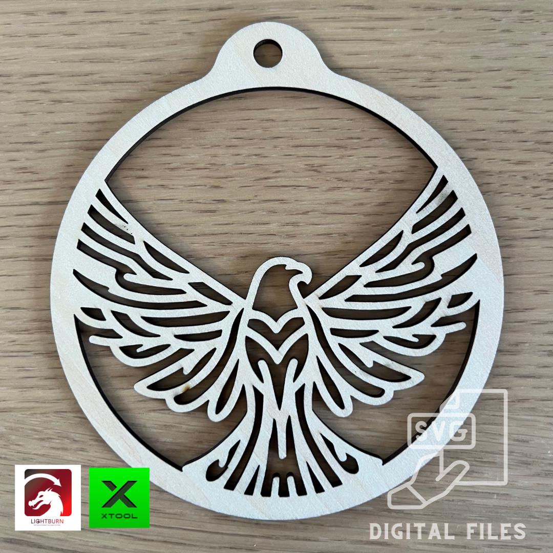 A Digital Eagle Ornament & Inspirational Card from Wet Nose Woodworks, made with PDF, SVG, and LightBurn laser cut files for xTool, sits on a table as a DIY bird freedom symbol gift.