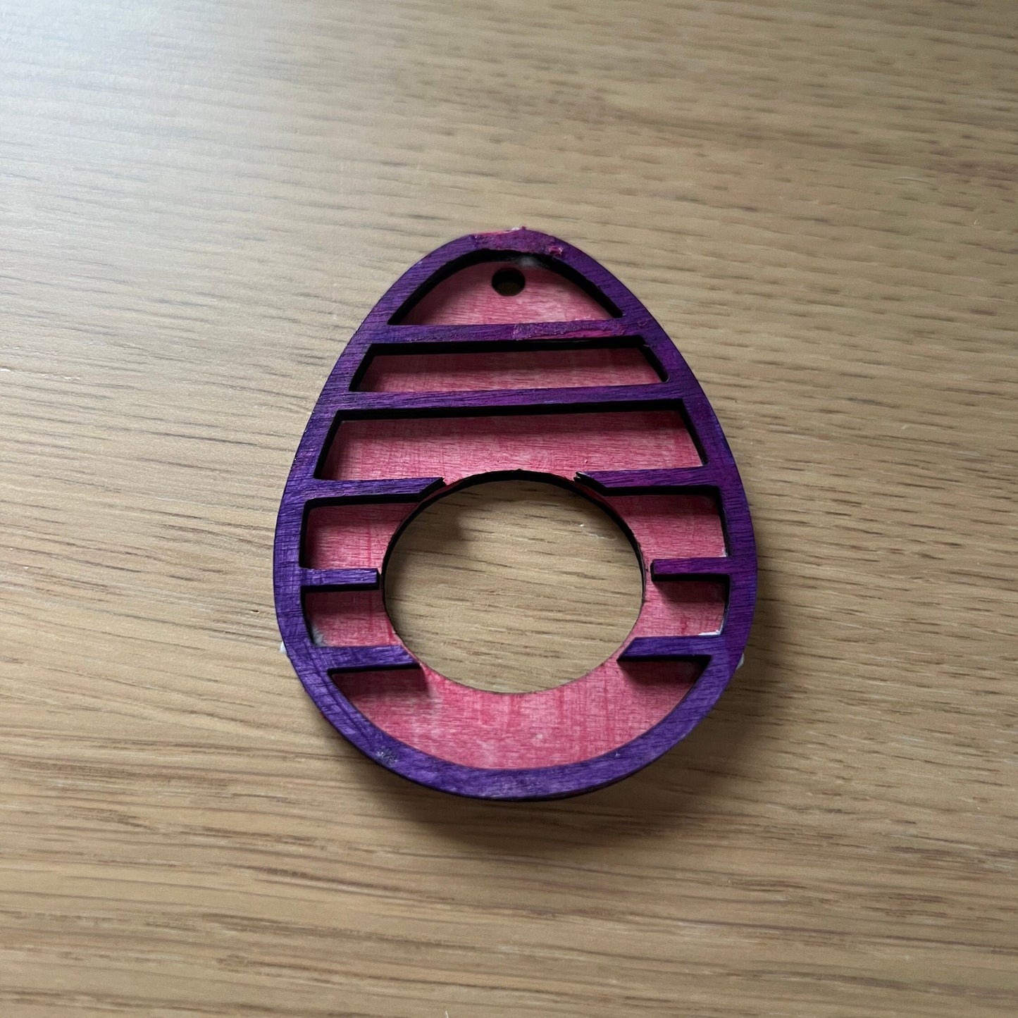 The Wet Nose Woodworks Digital Easter Lindt Holder Ornament features bunny and egg designs—SVG, PNG, PDF files for laser cutting—perfect DIY inspiration for crafters making Easter ornaments with Lindt chocolates.
