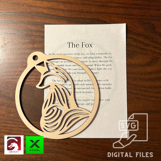 A Digital Fox Ornament & Inspirational Card Files by Wet Nose Woodworks, ideal for DIY crafting, is shown atop a printed poem. Logos for LightBurn, xTool, and digital files appear in the corners. Includes PDF, SVG, XCS and more.