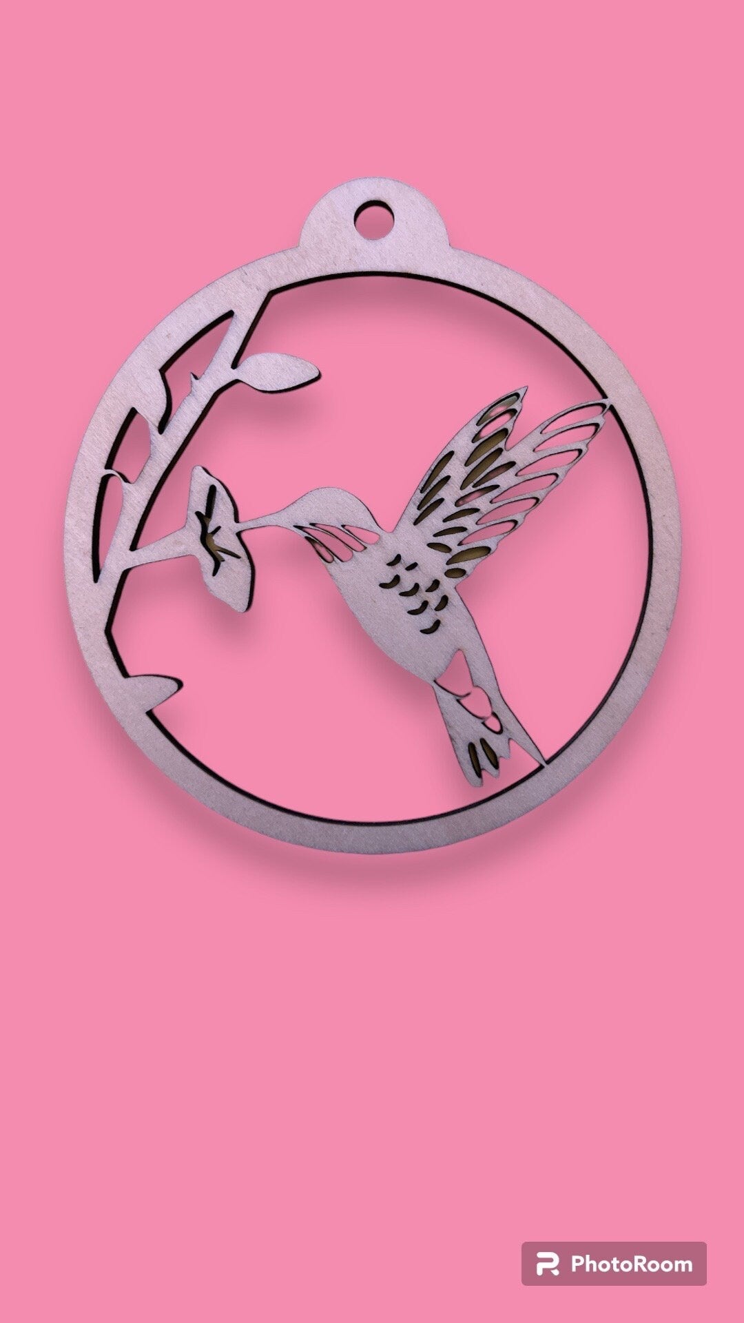 The Digital Hummingbird Ornament by Wet Nose Woodworks features a circular design of a hummingbird and flower, perfect as a DIY laser cut craft. Includes inspirational card files in PDF, SVG, and Lightburn formats—ideal for gifting and decor.