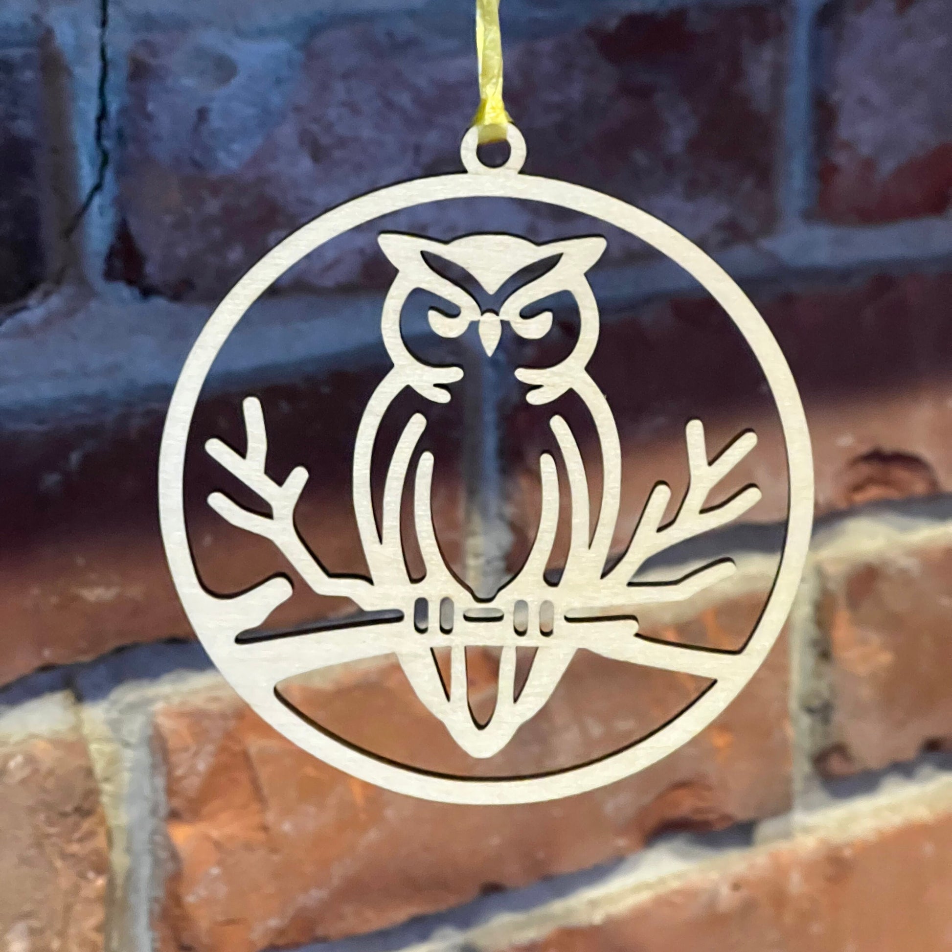 The Digital Owl Ornament and Inspirational Card Template by Wet Nose Woodworks features a wood owl with yellow ribbon on a poem titled The Owl—an ideal inspirational gift for teachers or mentors. Includes SVG/PDF laser cut files, xTool compatible.