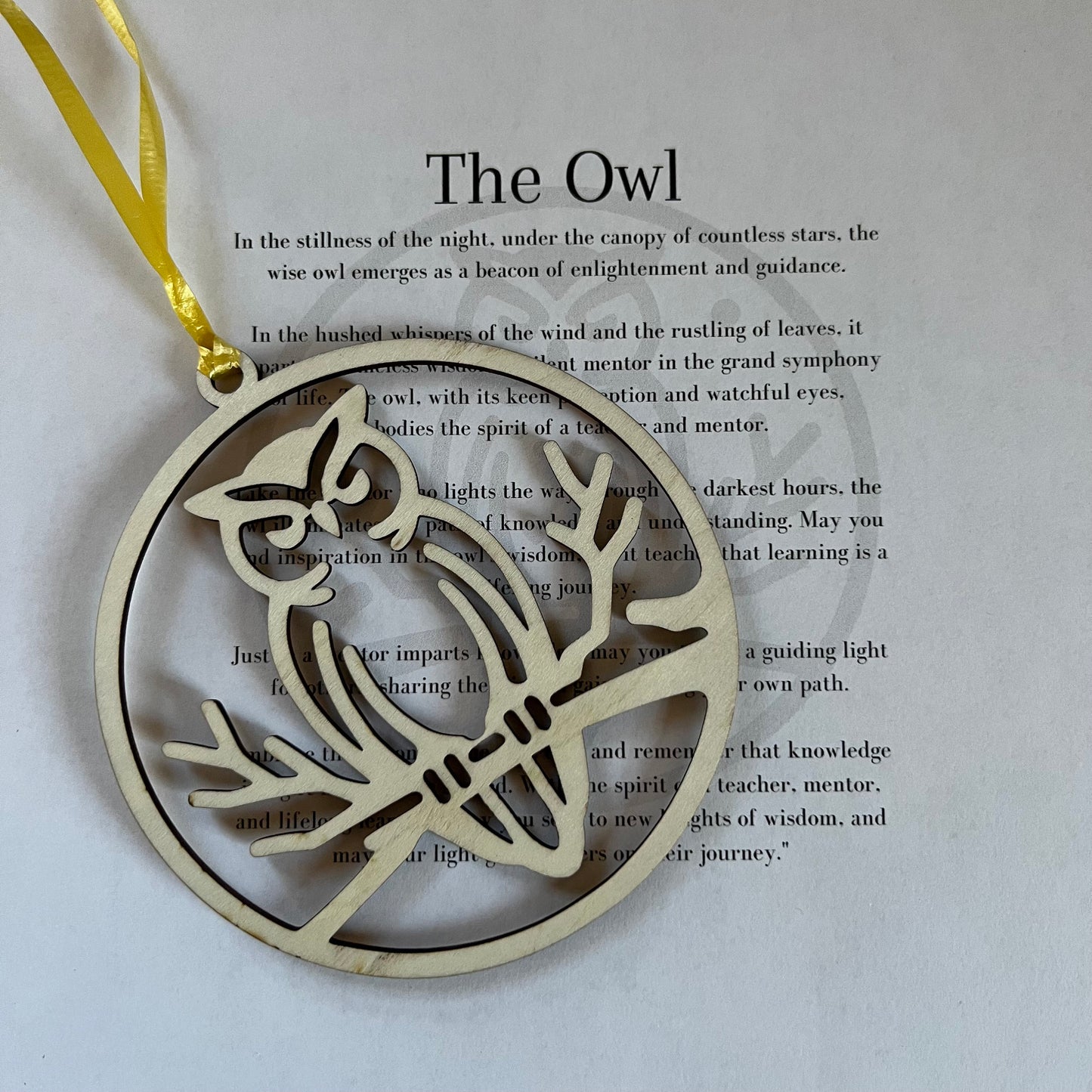 The Digital Owl Ornament and Inspirational Card Template by Wet Nose Woodworks features a wood owl with yellow ribbon on a poem titled The Owl—an ideal inspirational gift for teachers or mentors. Includes SVG/PDF laser cut files, xTool compatible.