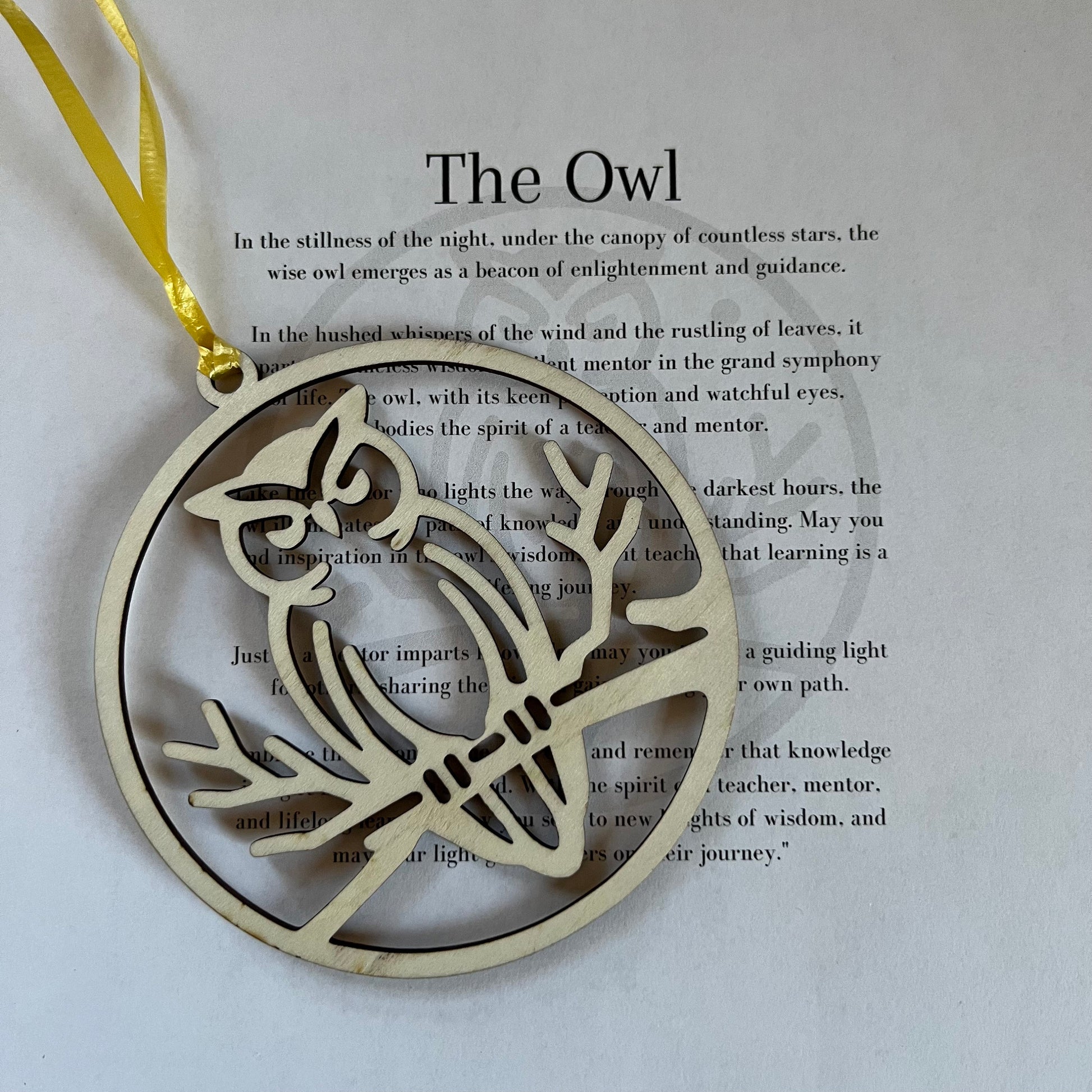 The Digital Owl Ornament and Inspirational Card Template by Wet Nose Woodworks features a wood owl with yellow ribbon on a poem titled The Owl—an ideal inspirational gift for teachers or mentors. Includes SVG/PDF laser cut files, xTool compatible.