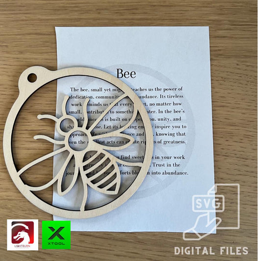 A Digital cute honey Bee Silhouette Ornament by Wet Nose Woodworks, paired with an inspirational card, sits atop a Bee poem. LightBurn, xTool, and download icons indicate PDF/SVG laser cut files included for DIY crafts.