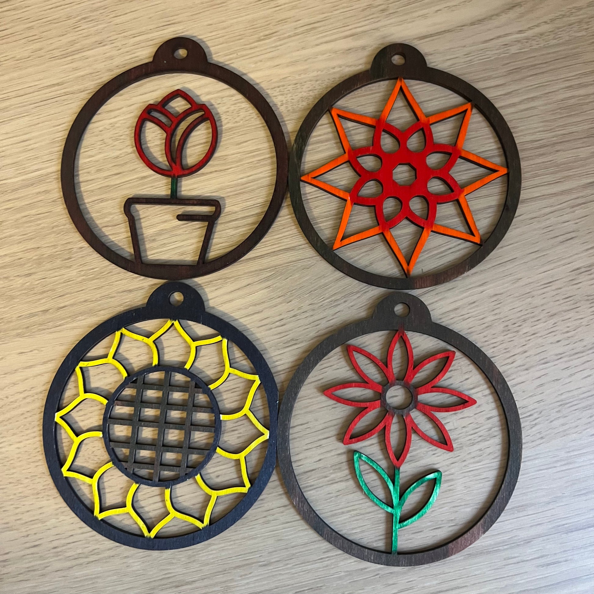 The Floral SVG Bundle by Wet Nose Woodworks features laser-ready Sunflower, Tulip, Daisy & Swirl designs—ideal for unique spring decor or showcasing floral art with xTool, LightBurn, or Glowforge digital downloads.