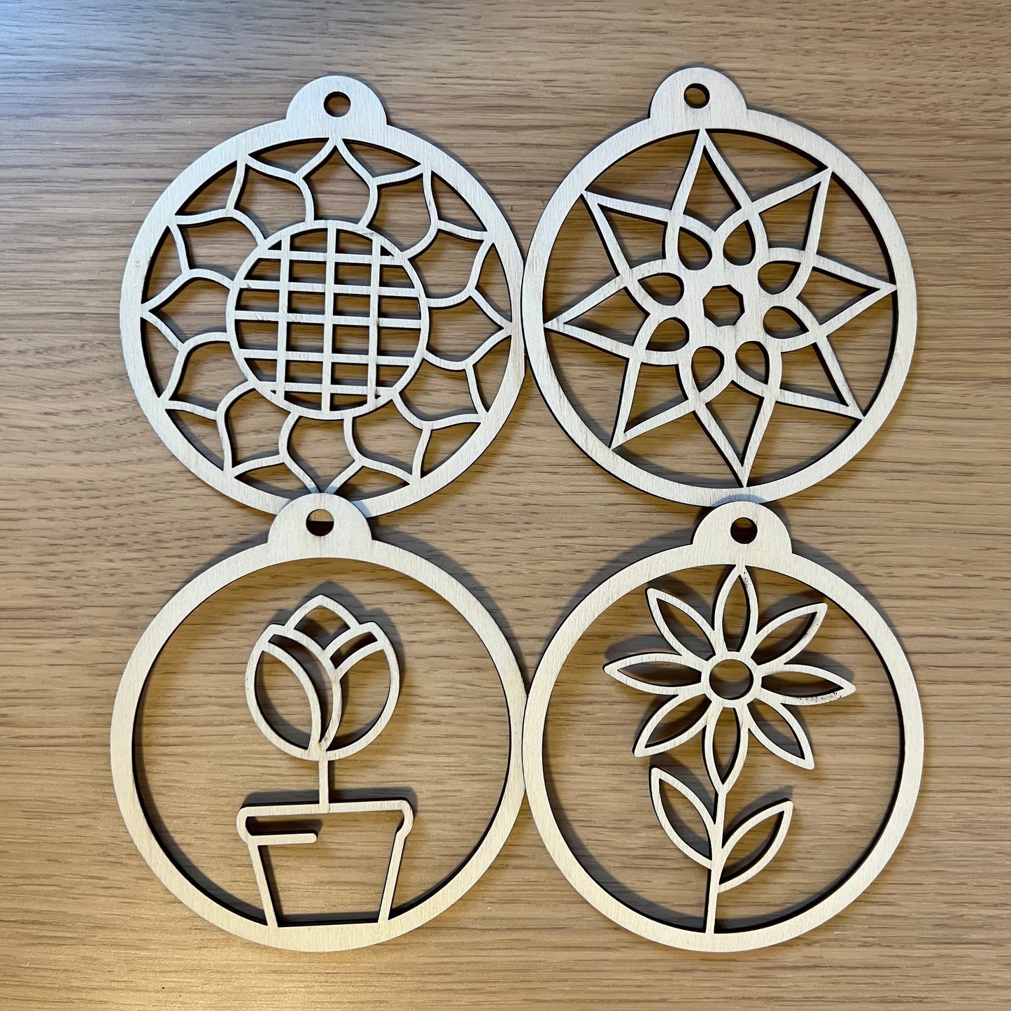 The Floral SVG Bundle by Wet Nose Woodworks features laser-ready Sunflower, Tulip, Daisy & Swirl designs—ideal for unique spring decor or showcasing floral art with xTool, LightBurn, or Glowforge digital downloads.