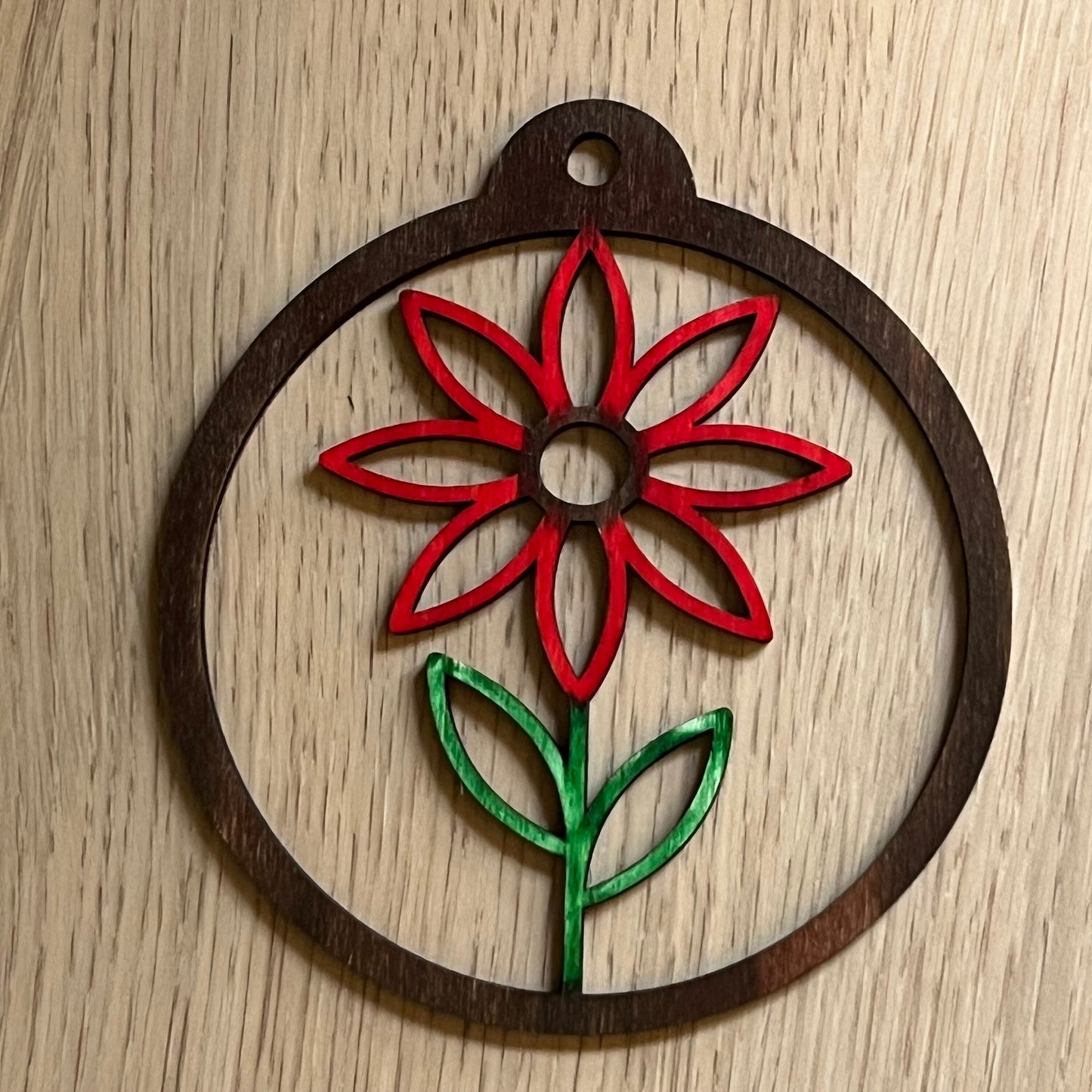 The Floral SVG Bundle by Wet Nose Woodworks features laser-ready Sunflower, Tulip, Daisy & Swirl designs—ideal for unique spring decor or showcasing floral art with xTool, LightBurn, or Glowforge digital downloads.