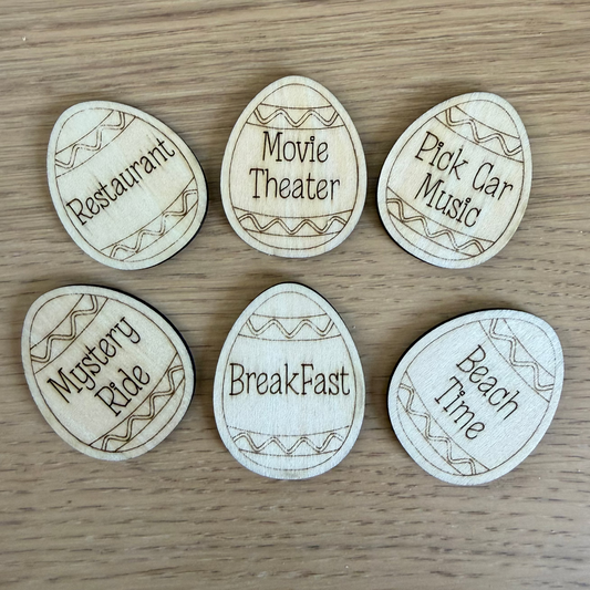 Set of wooden tokens with text on a wooden surface