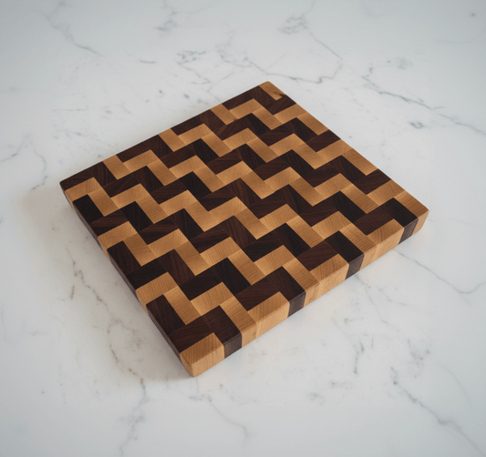 Wooden cutting board with a zigzag pattern on a marble surface
