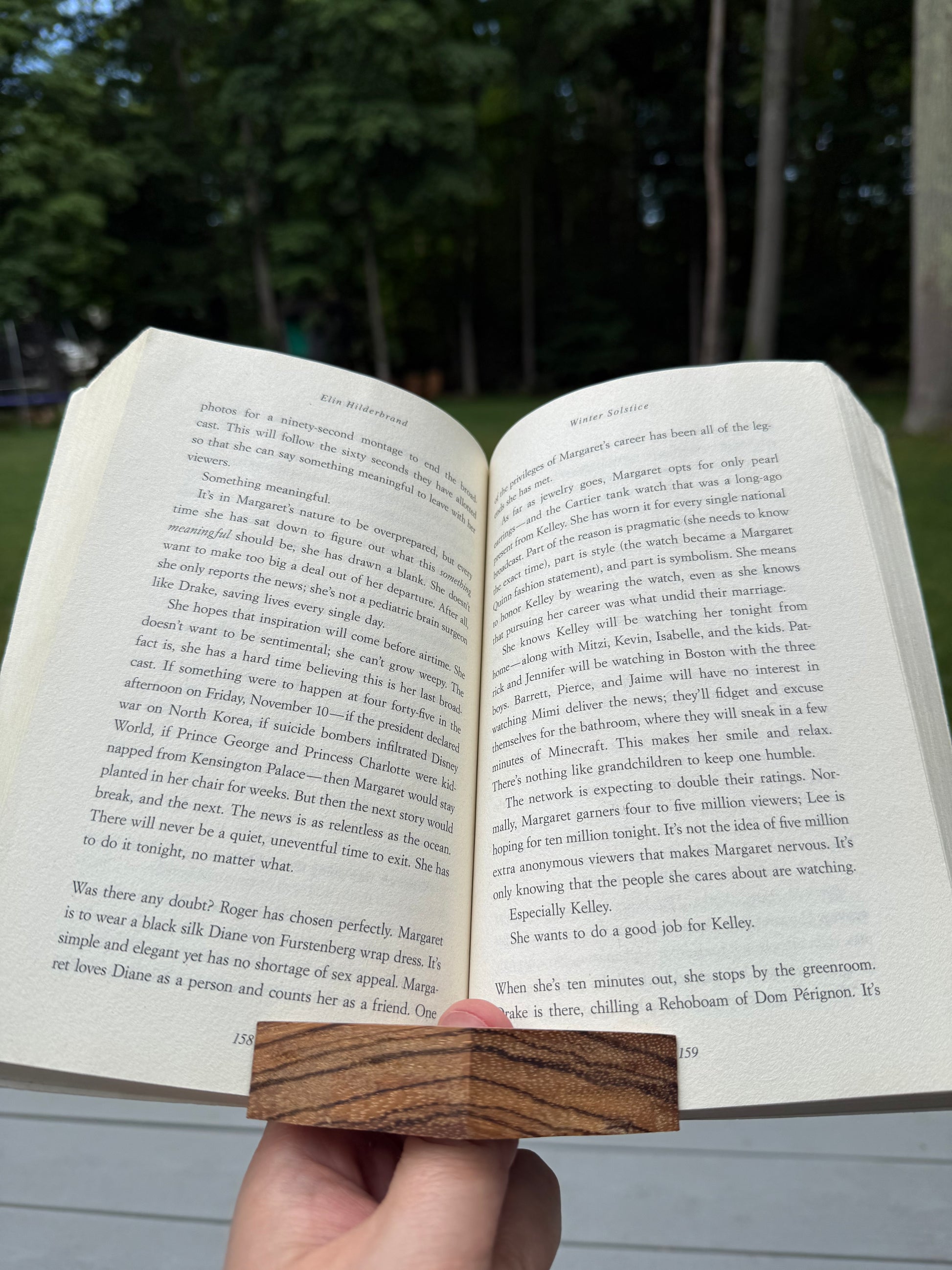 Handmade wooden thumb book page holder by Wet Nose Woodworks
