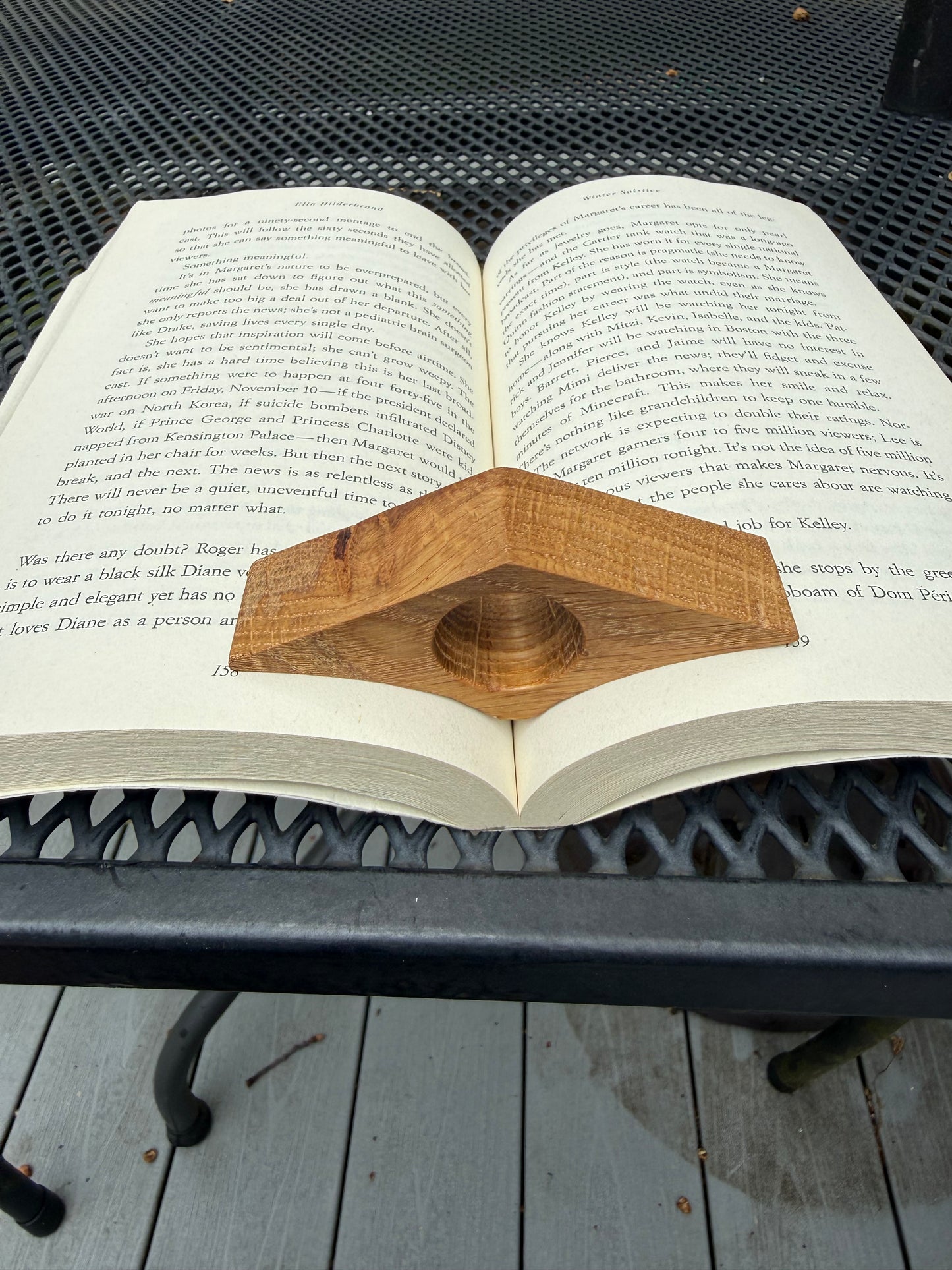 Close-up of hardwood grain on handmade thumb book holder
